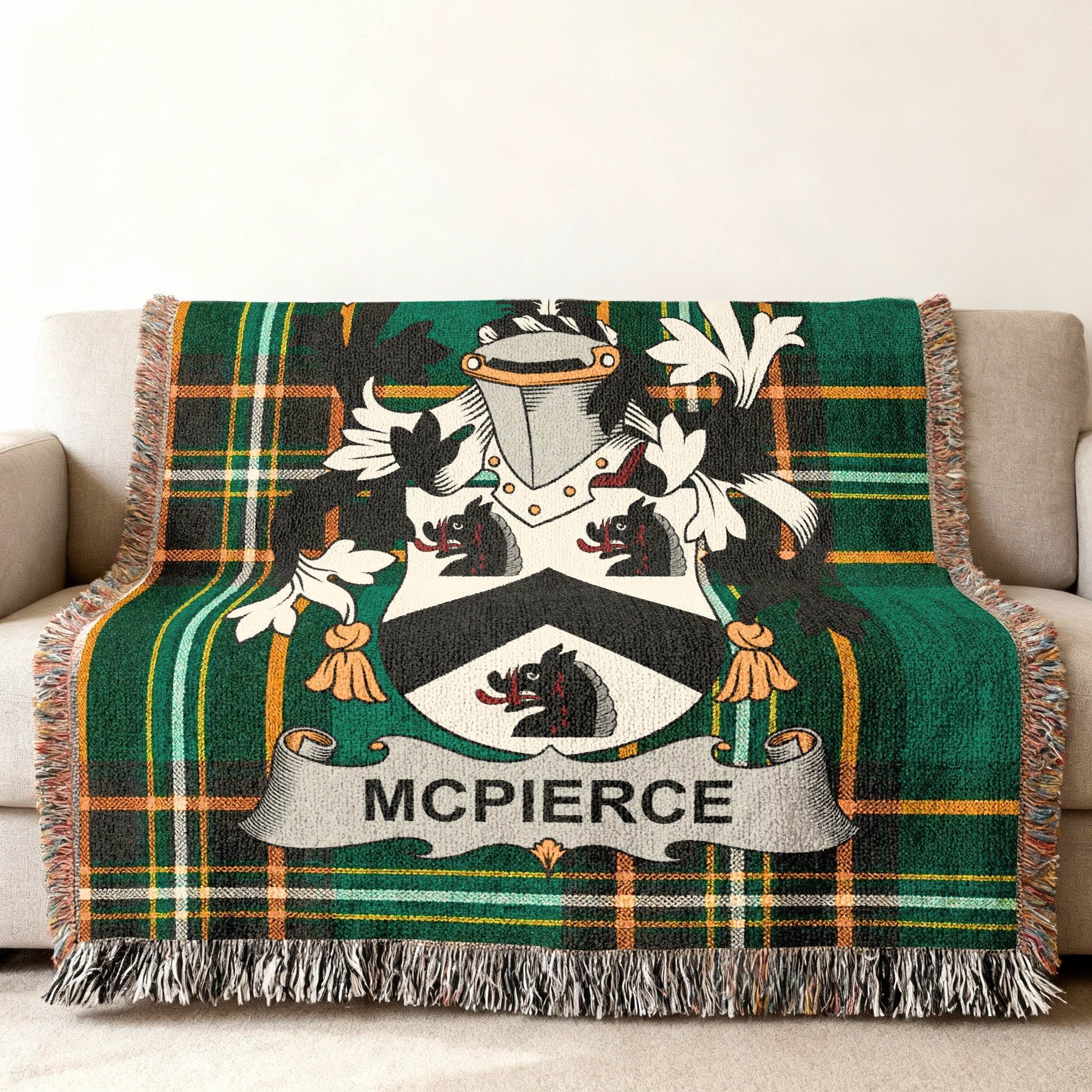 Green tartan throw blanket with MCPIERCE family crest.