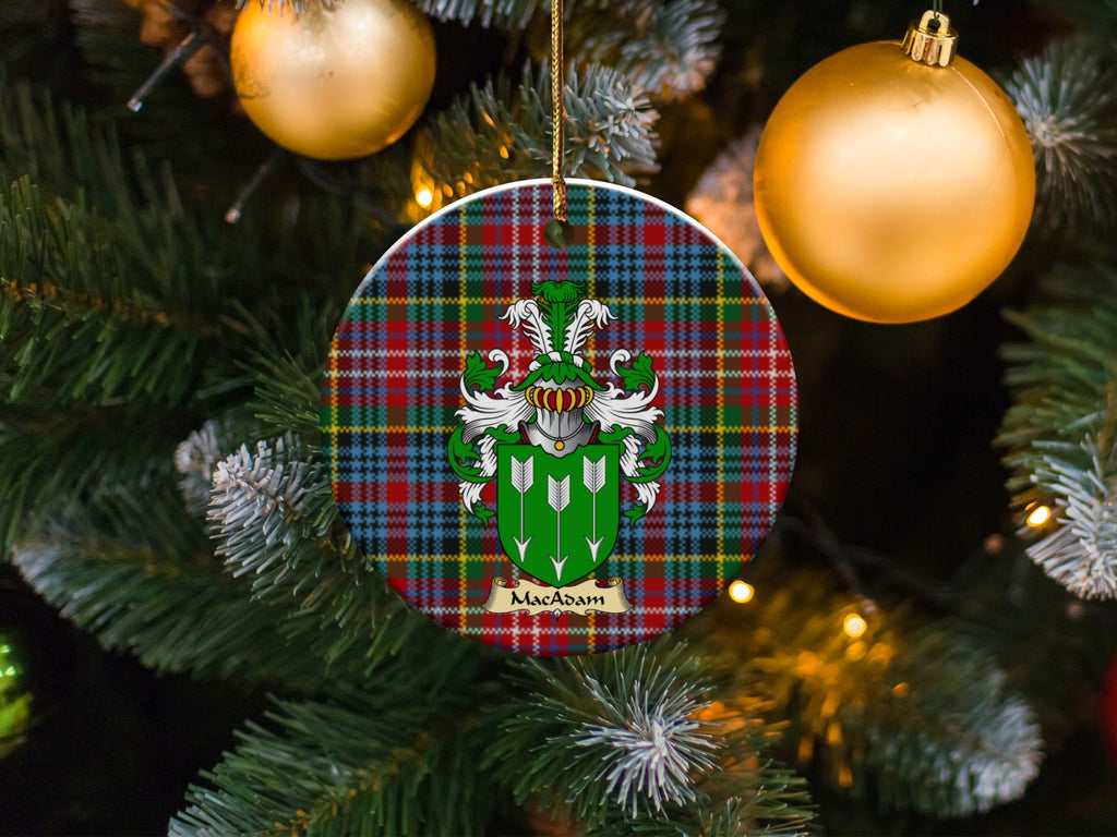 MacAdam family emblem ceramic Christmas ornament with Caledonia tartan background in festive holiday décor