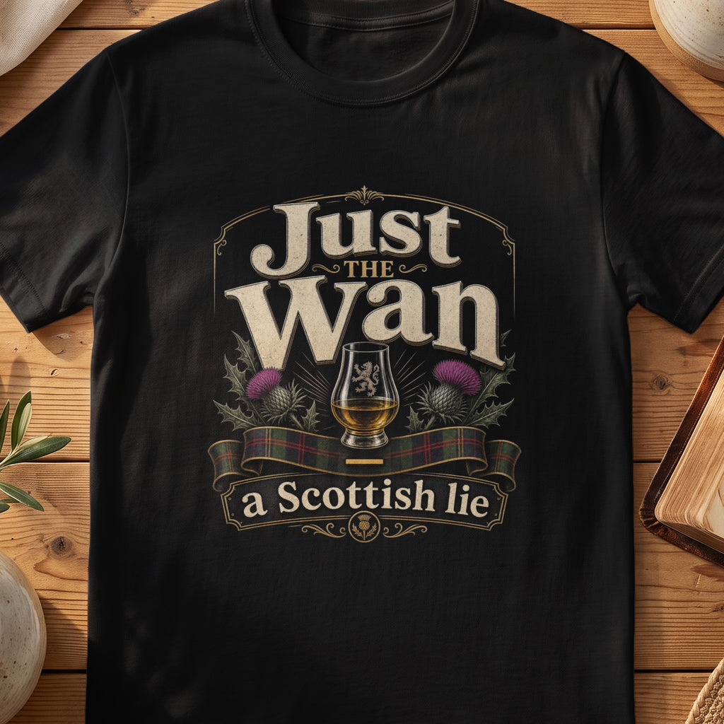 Black Gildan 64000 unisex T-shirt flatlay with Just the Wan A Scottish Lie Scottish graphic design
