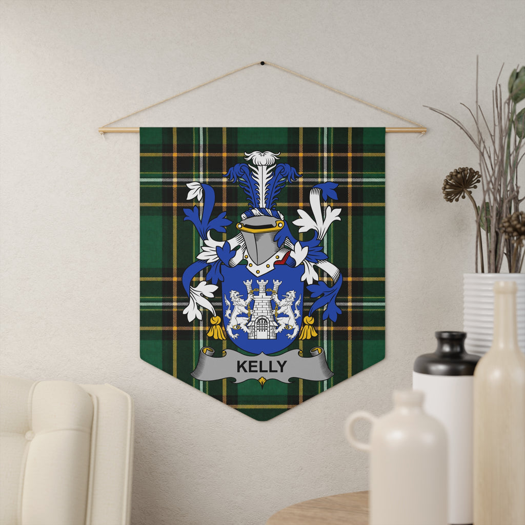 Kelly family crest on a green tartan banner hanging on a textured wall.