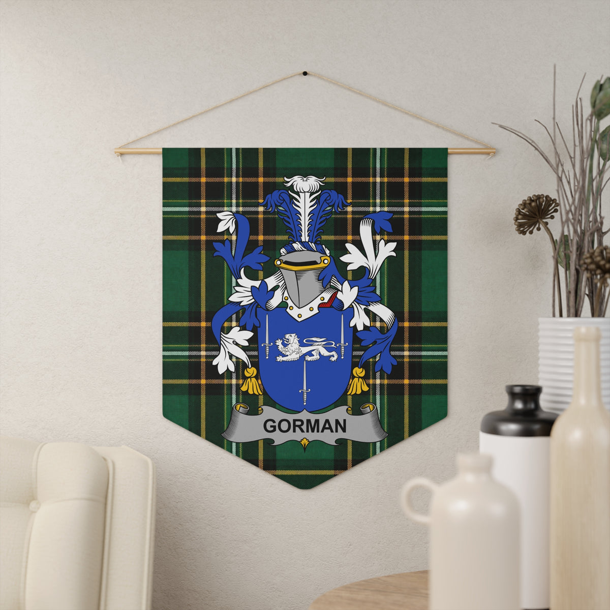 Gorman family crest on a green plaid banner hanging on a wall.