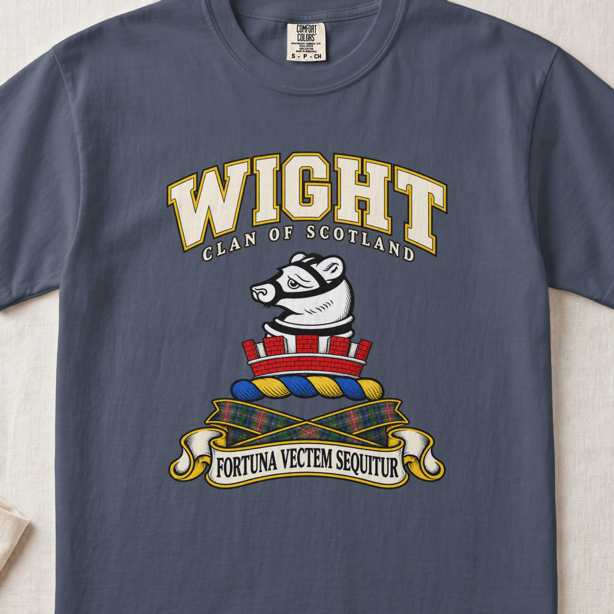 Wight Scottish clan T-shirt in Midnight, front view with a white muzzled animal head above a red mural crown and motto design.