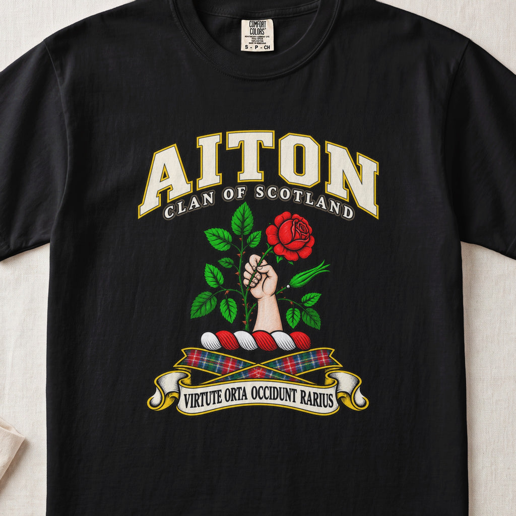 Aiton Scottish clan T-shirt in Black, front view with a hand holding a red rose with green leaves and motto design.