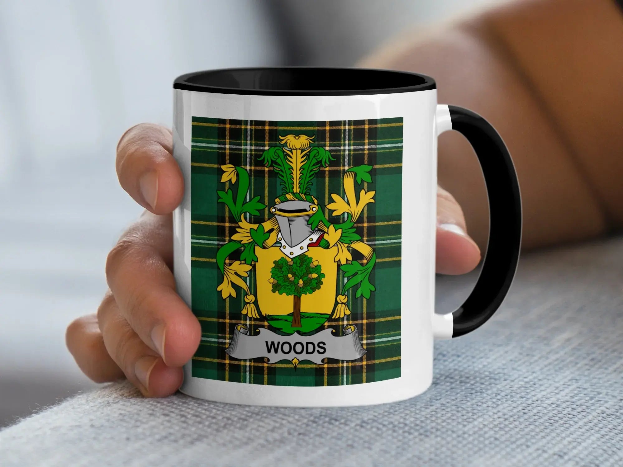 Mug with the Woods family crest on a plaid background.