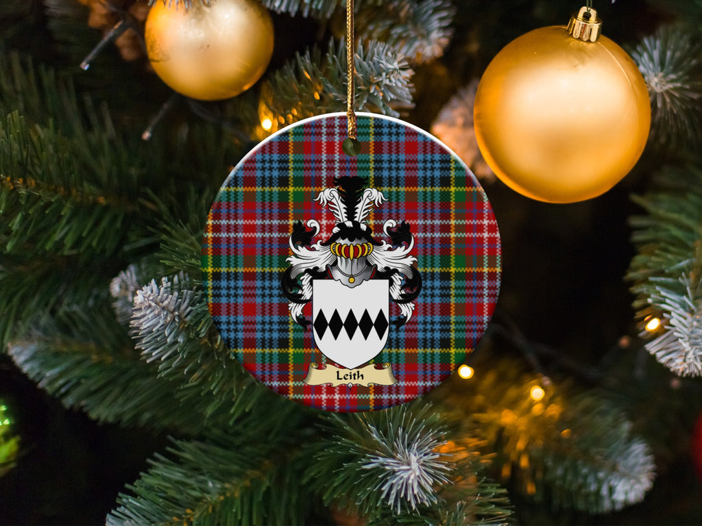 Leith family emblem ceramic Christmas ornament with Caledonia tartan background in festive holiday décor