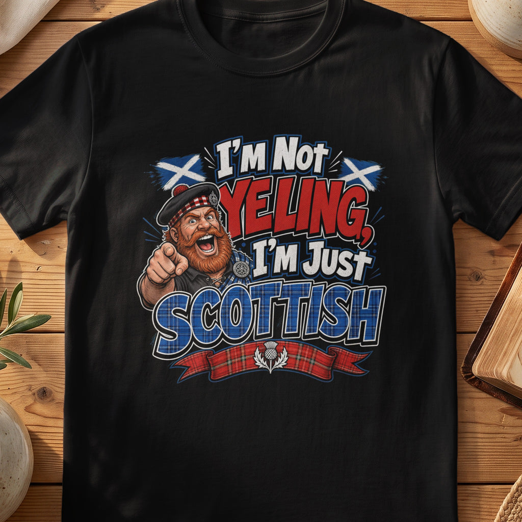 Black Gildan 64000 unisex T-shirt flatlay with I'm Not Yelling I'm Just Scottish Scottish graphic design