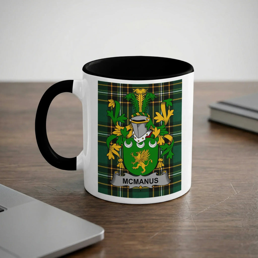 McManus Irish heritage mug with black handle and family crest