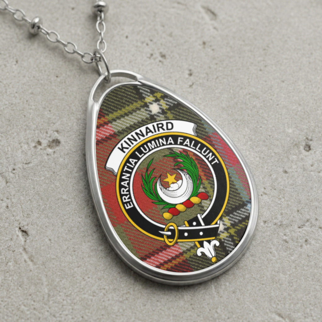 Kinnaird clan Scottish tartan necklace with clan crest on tartan background