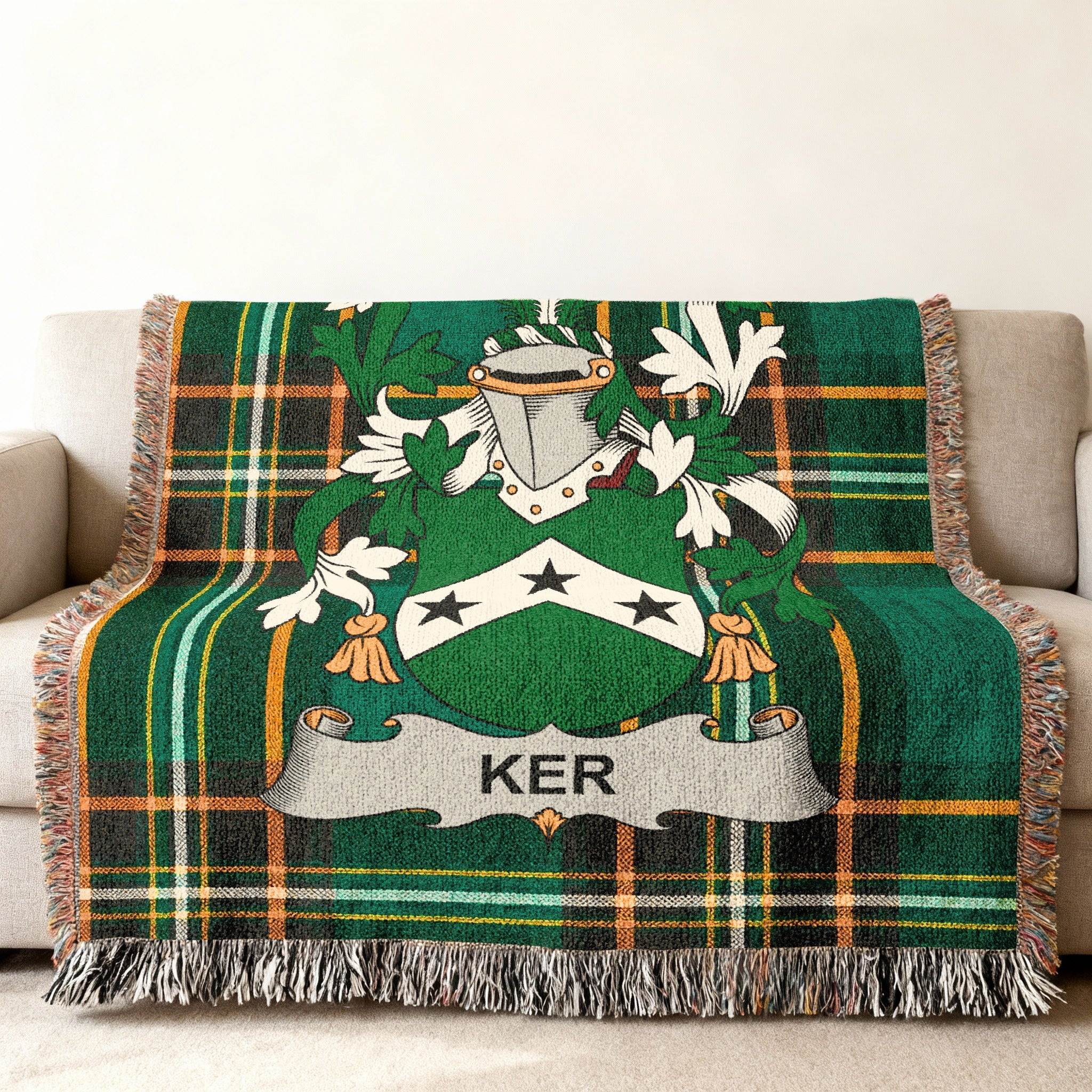 Green tartan throw blanket with Ker family crest.