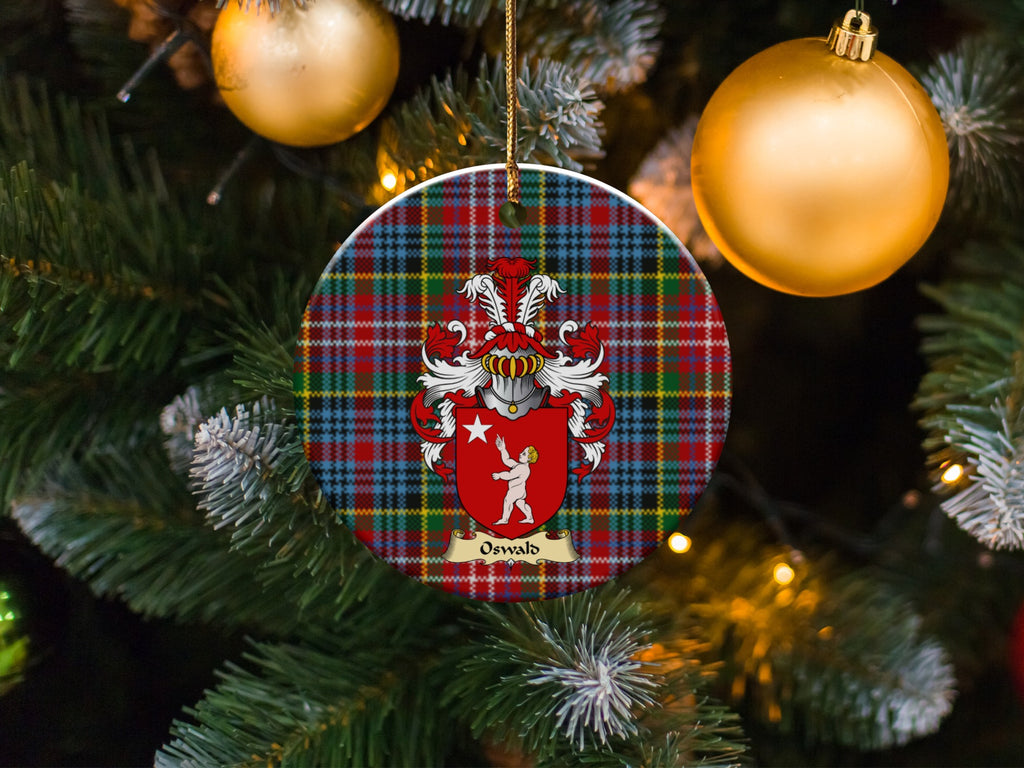 Oswald family emblem ceramic Christmas ornament with Caledonia tartan background in festive holiday décor