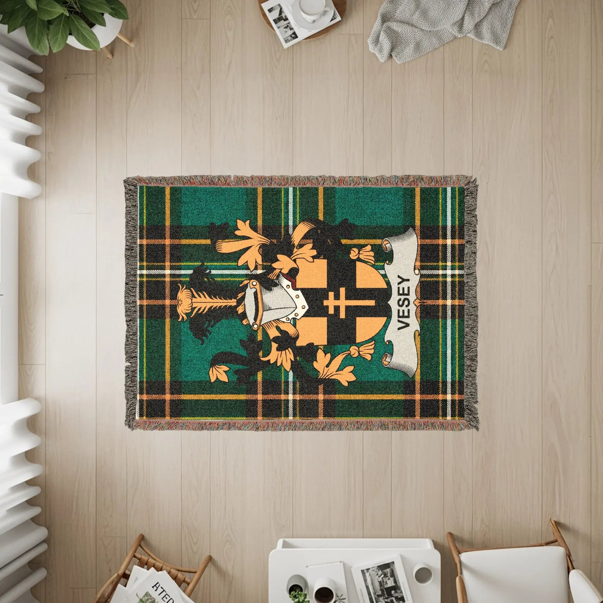 Tapestry featuring the Vesey clan crest on a green and black plaid background.