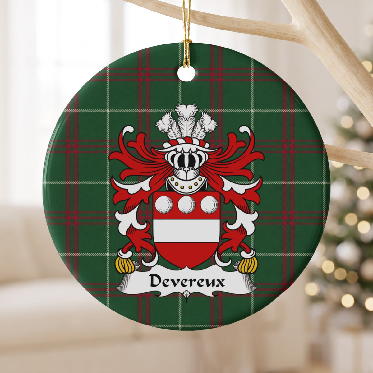 Devereux ornament hanging from a pale wooden branch; three white roundels above a white horizontal band on a red shield on Welsh national tartan.