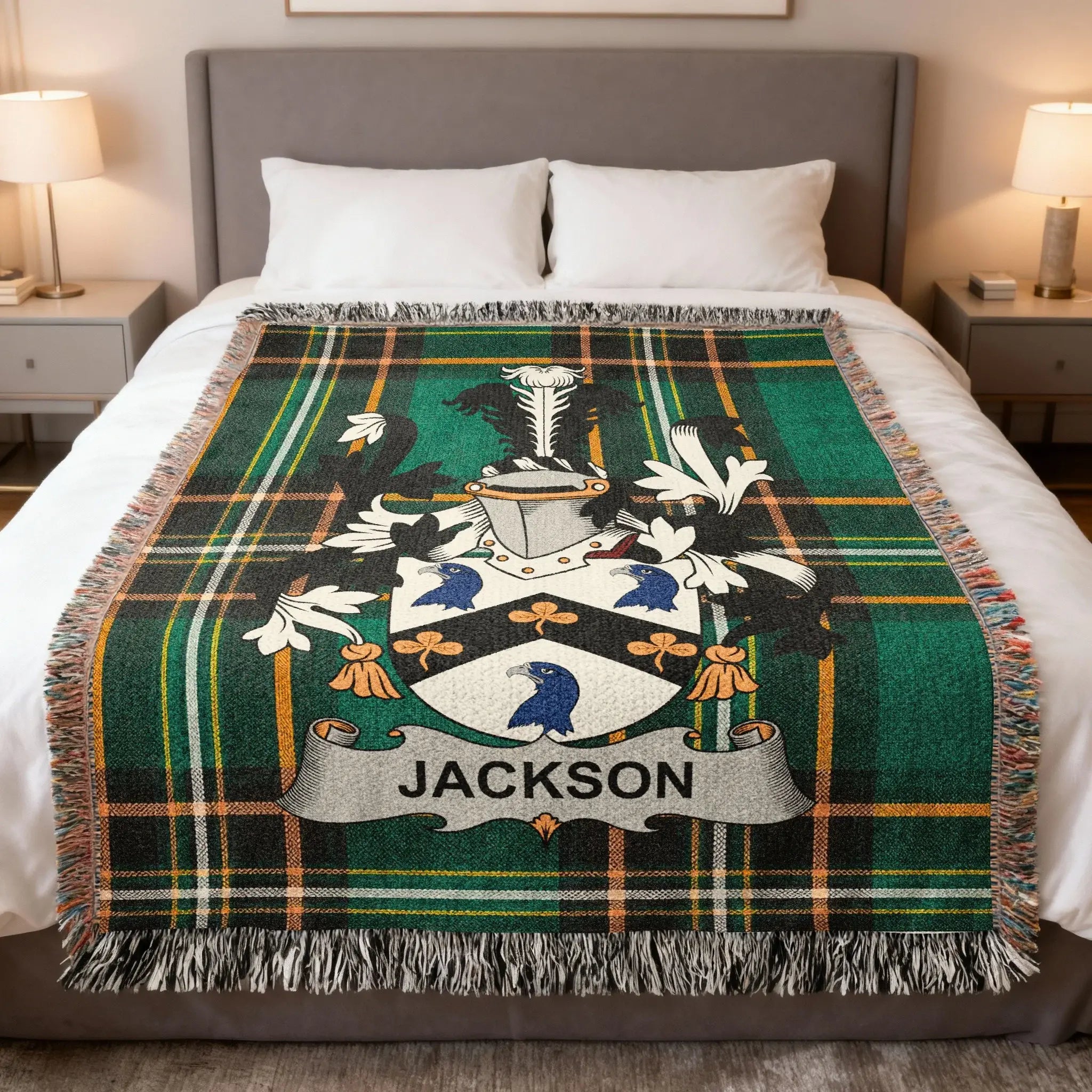 Plaid throw blanket with a family crest and "Jackson" banner.