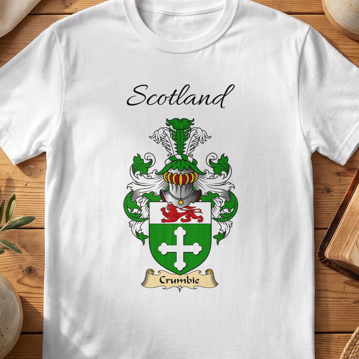 White Crumbie Scottish family shield T-shirt featuring a white cross on green beneath a red lion
