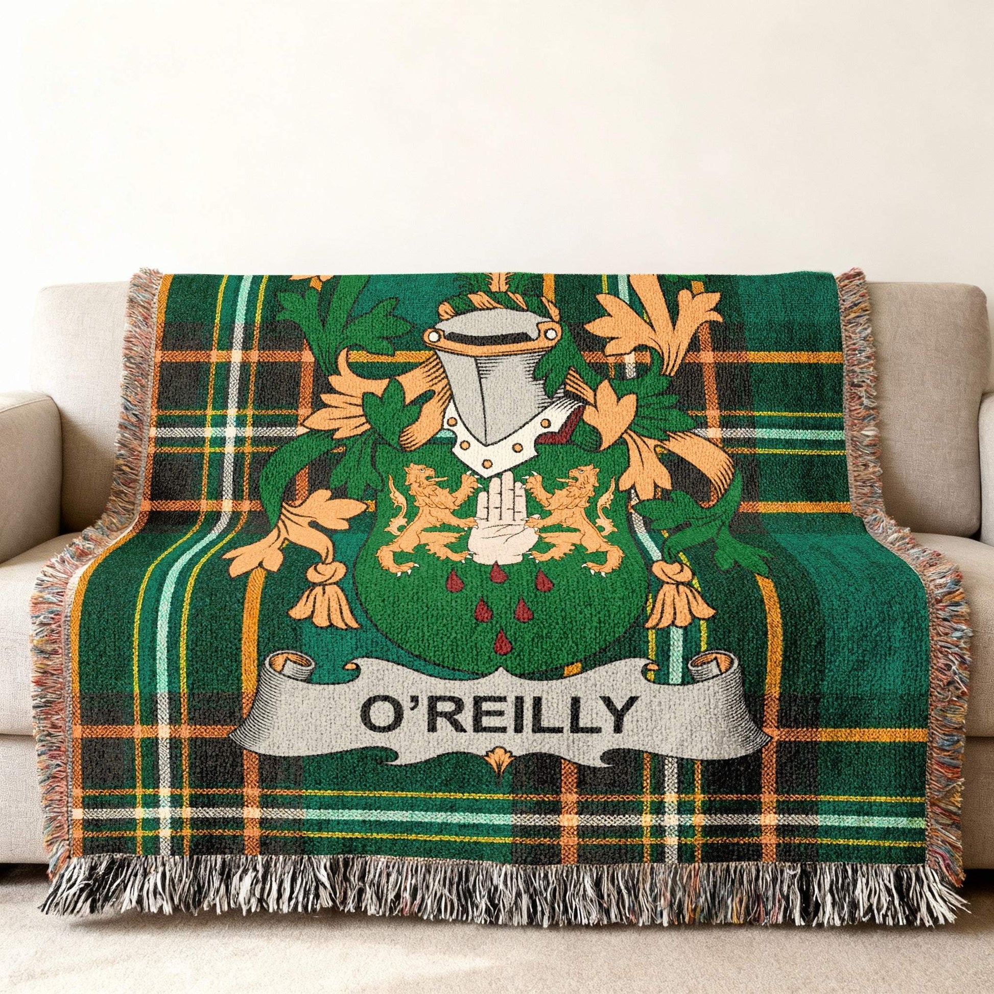 O'Reilly tartan throw blanket featuring a coat of arms with a shield and helmet.