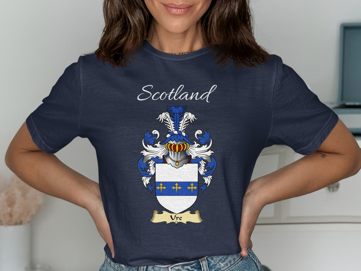 Model wearing the navy Ure family crest T-shirt featuring “Scotland” and the surname banner.