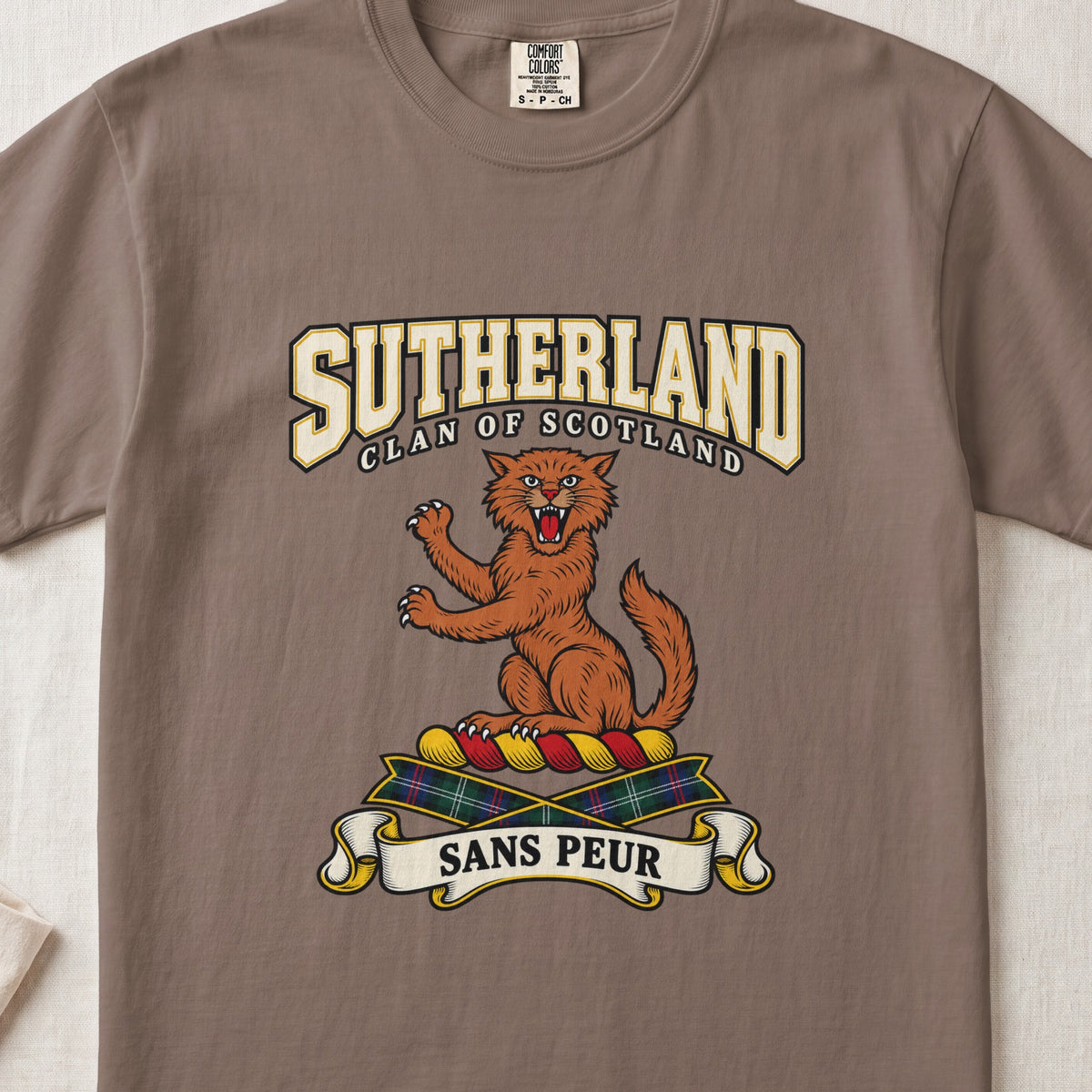 Sutherland graphic T-shirt in Espresso brown, front flat lay showing varsity lettering and orange-brown wildcat with raised paws and open mouth.