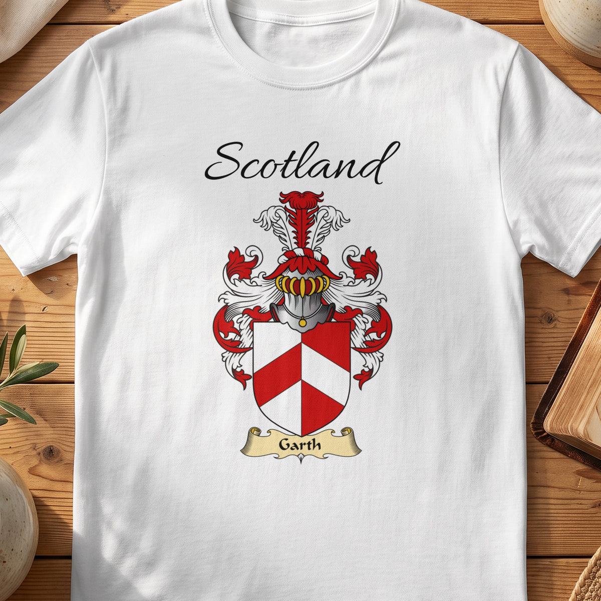 White Garth Scottish family shield T-shirt featuring a red-and-white geometric chevron design