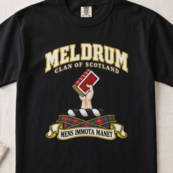 Meldrum Scottish clan T-shirt in Black, front view with a hand holding a red book and motto banner.