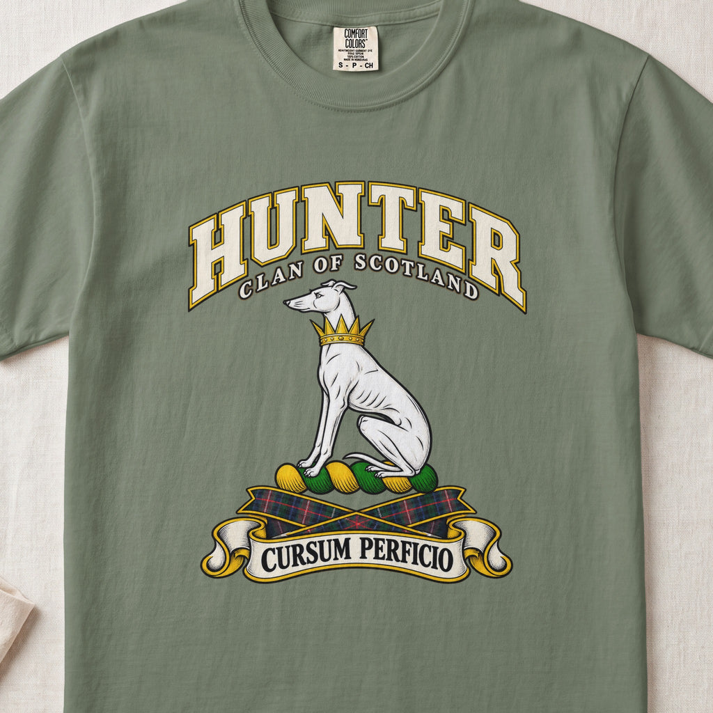 Hunter Scottish clan T-shirt in Moss, front view with a seated white hound with a golden collar and motto banner.