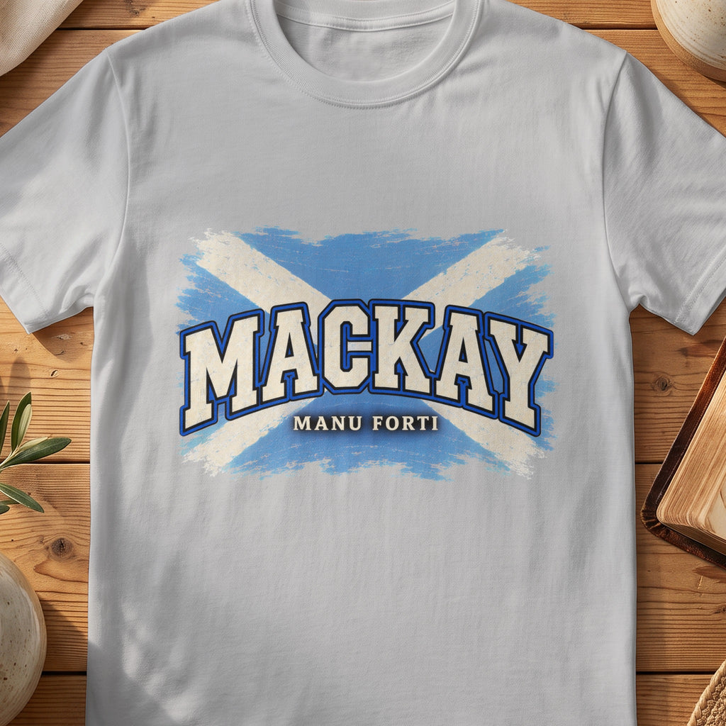MacKay Scottish Saltire T-shirt in Sport Grey, with distressed blue and cream flag and “Manu Forti” lettering.