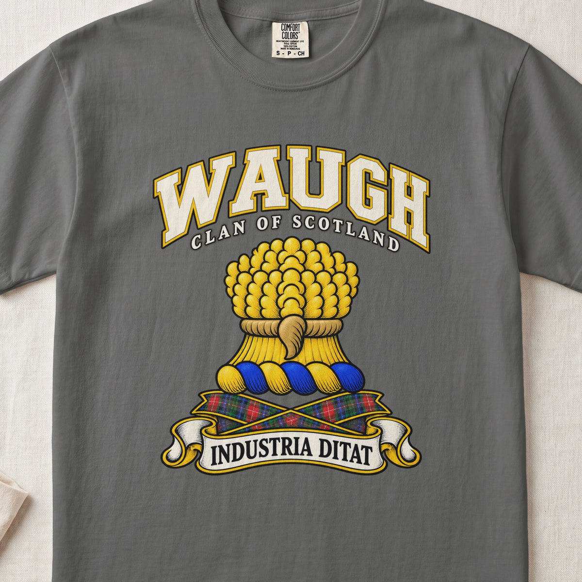 Waugh Scottish clan T-shirt in Pepper, front view with a gold sheaf of wheat and motto banner.