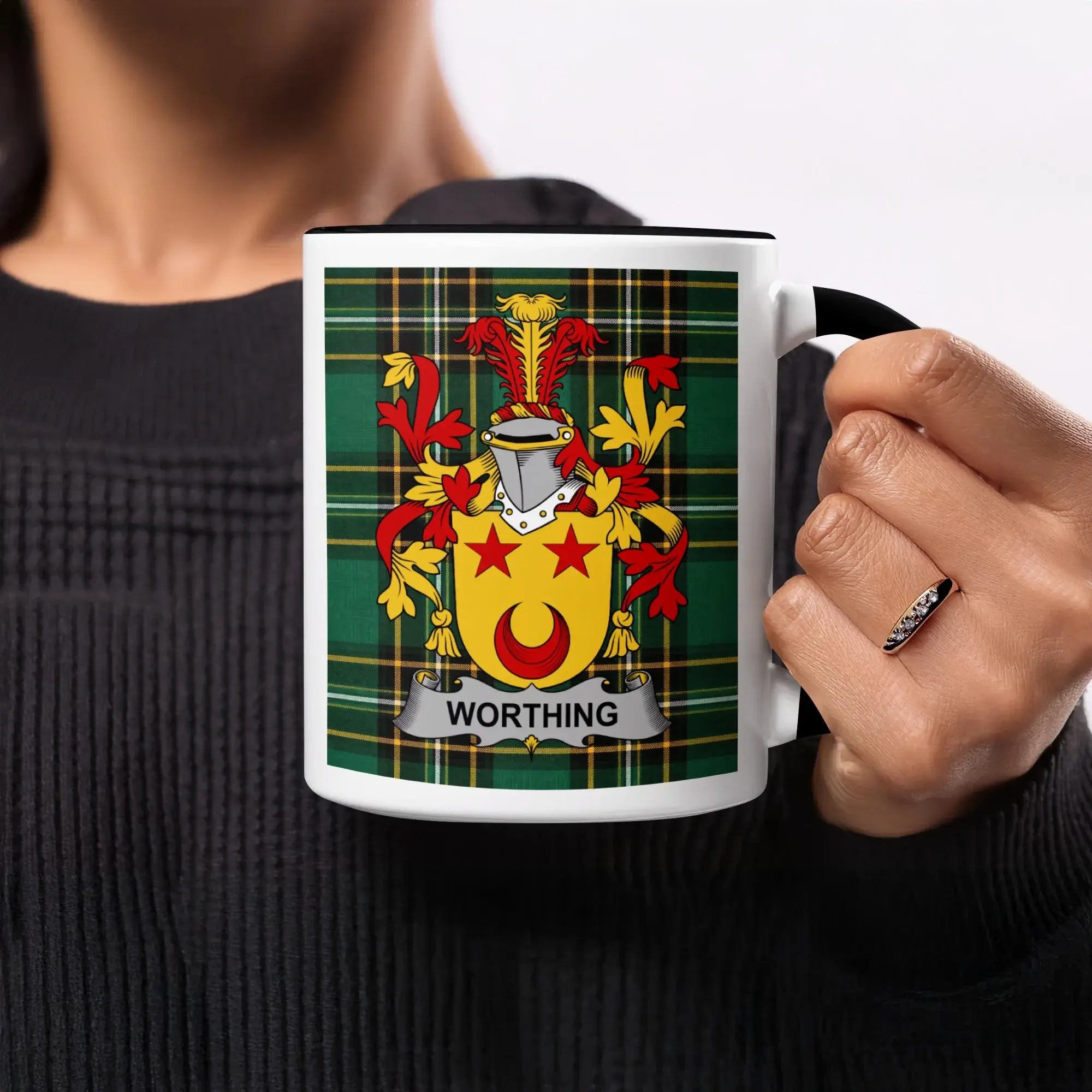 Black mug with green plaid pattern and the Worthington family crest.