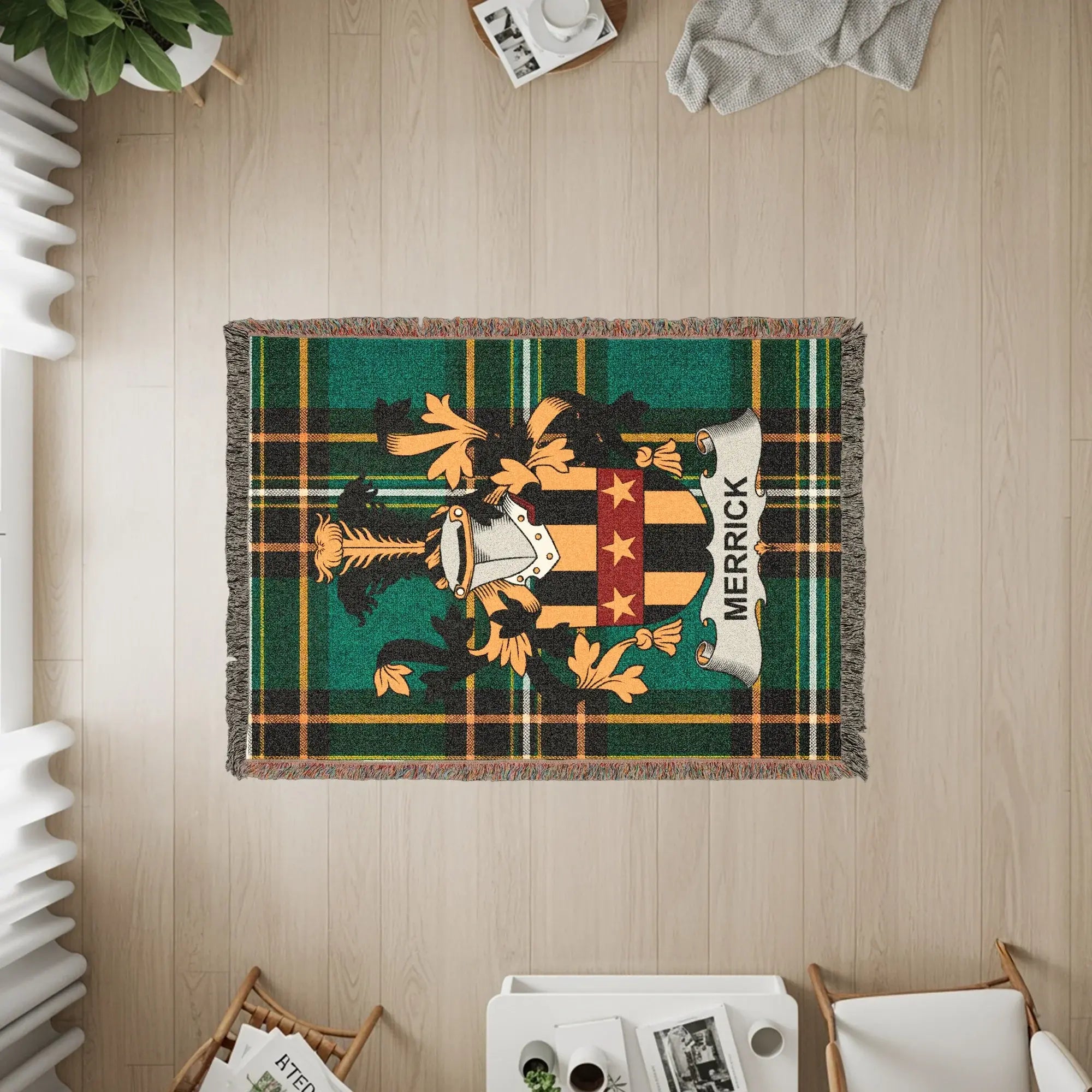 Merrick family crest on a green plaid woven blanket.
