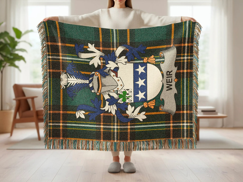 Tartan blanket with Weir clan crest and fringe.