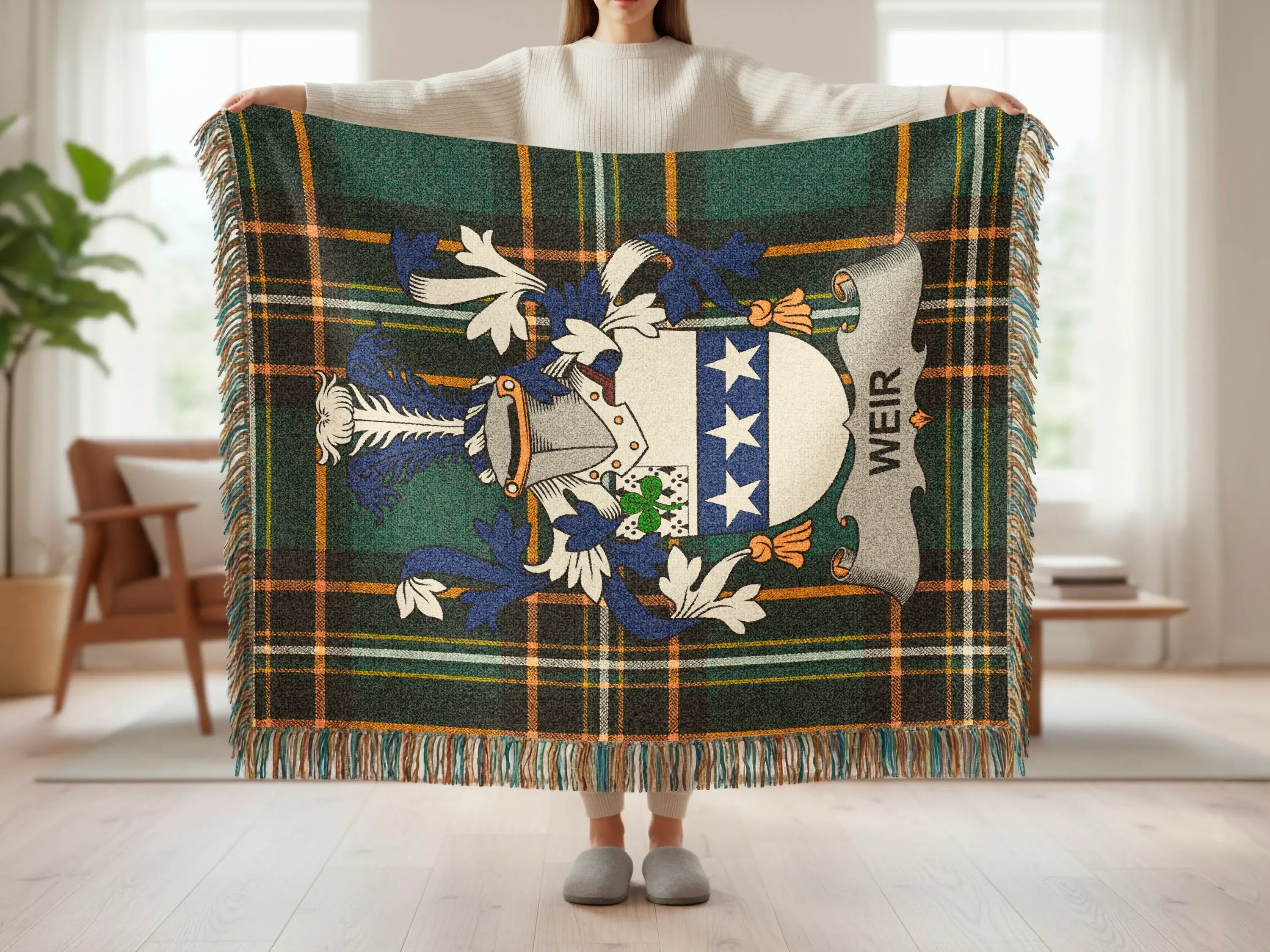 Tartan blanket with Weir clan crest and fringe.