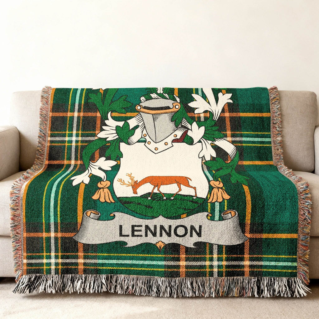 Green plaid throw blanket with white and green crest featuring a deer and "LENNON" text.
