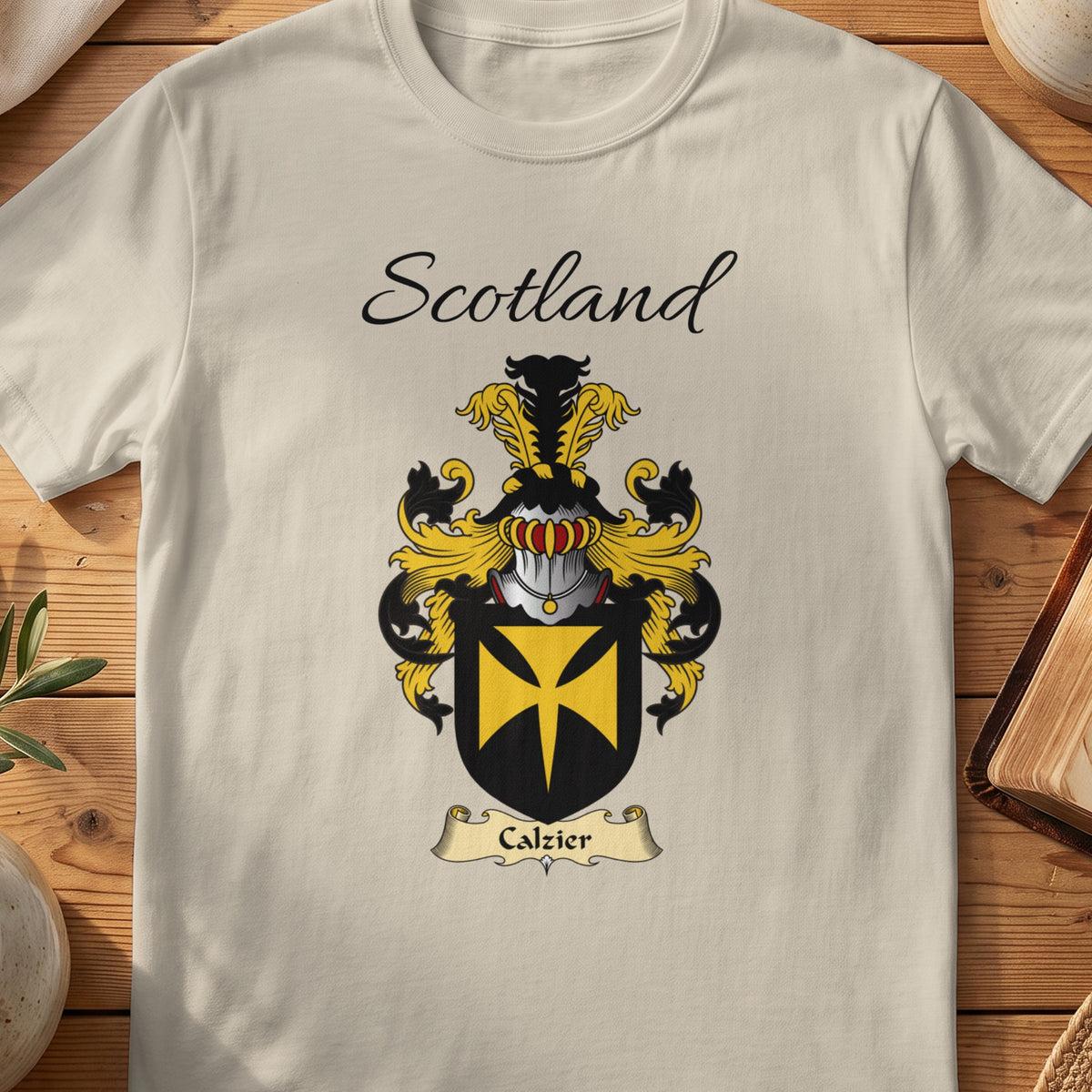 Sand Calzier Scottish family shield T-shirt featuring a gold cross motif on a black shield