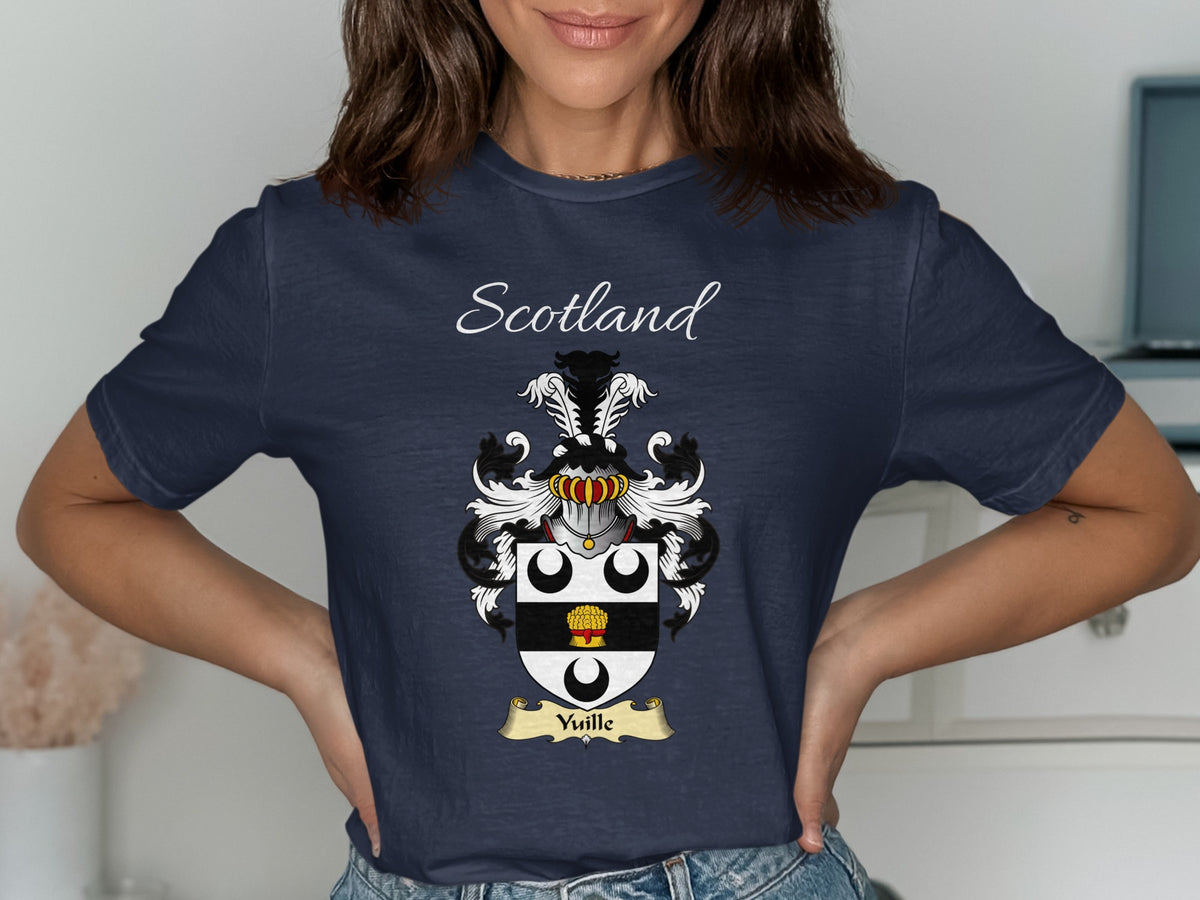 Model wearing the navy Yuille family crest T-shirt featuring “Scotland” and the surname banner.