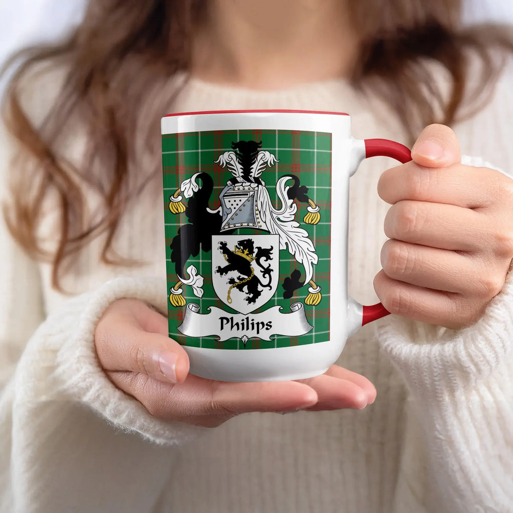Philips Welsh family name mug with red accent and coat of arms on tartan background