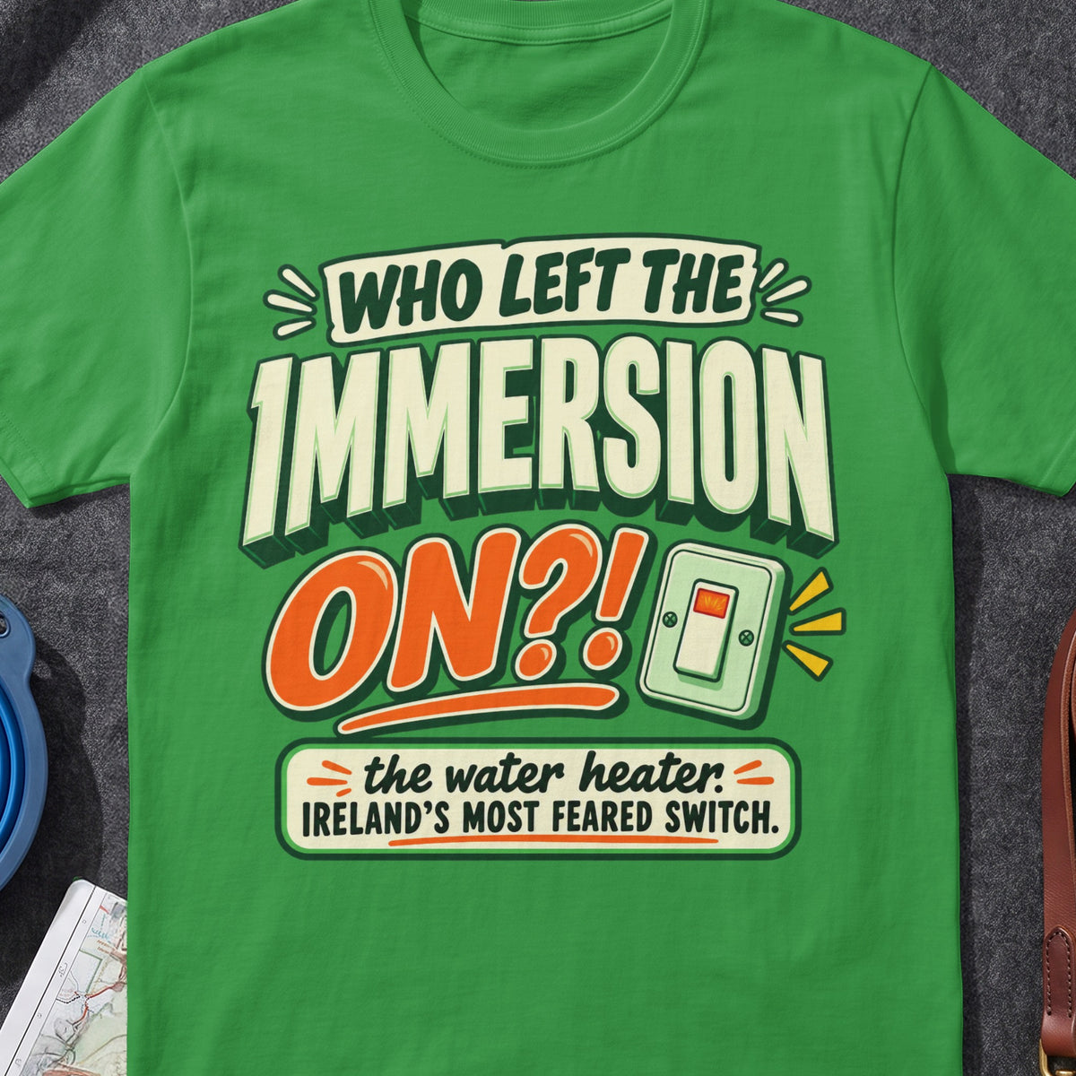 Who Left The Immersion On funny Irish T-shirt in Irish Green, flat-lay mockup
