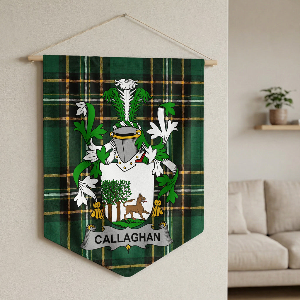 Callaghan family crest on green tartan fabric banner.