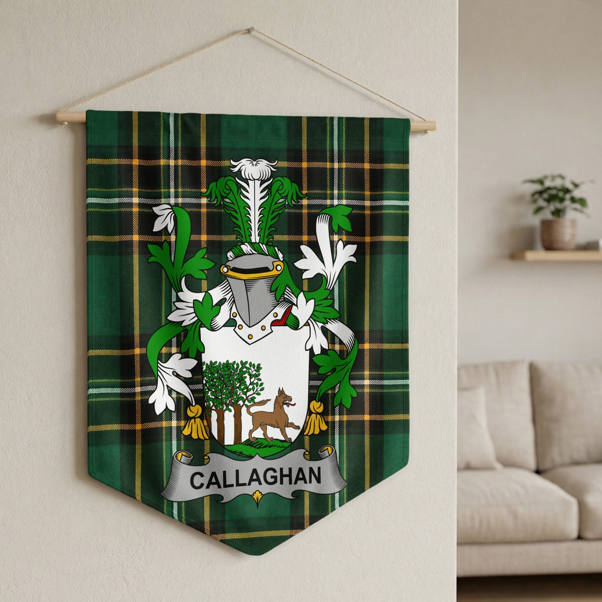 Callaghan family crest on green tartan fabric banner.