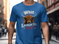 Blue t-shirt with Highland cow graphic and text "Whit Are Ye Lookin' At, Pal?".