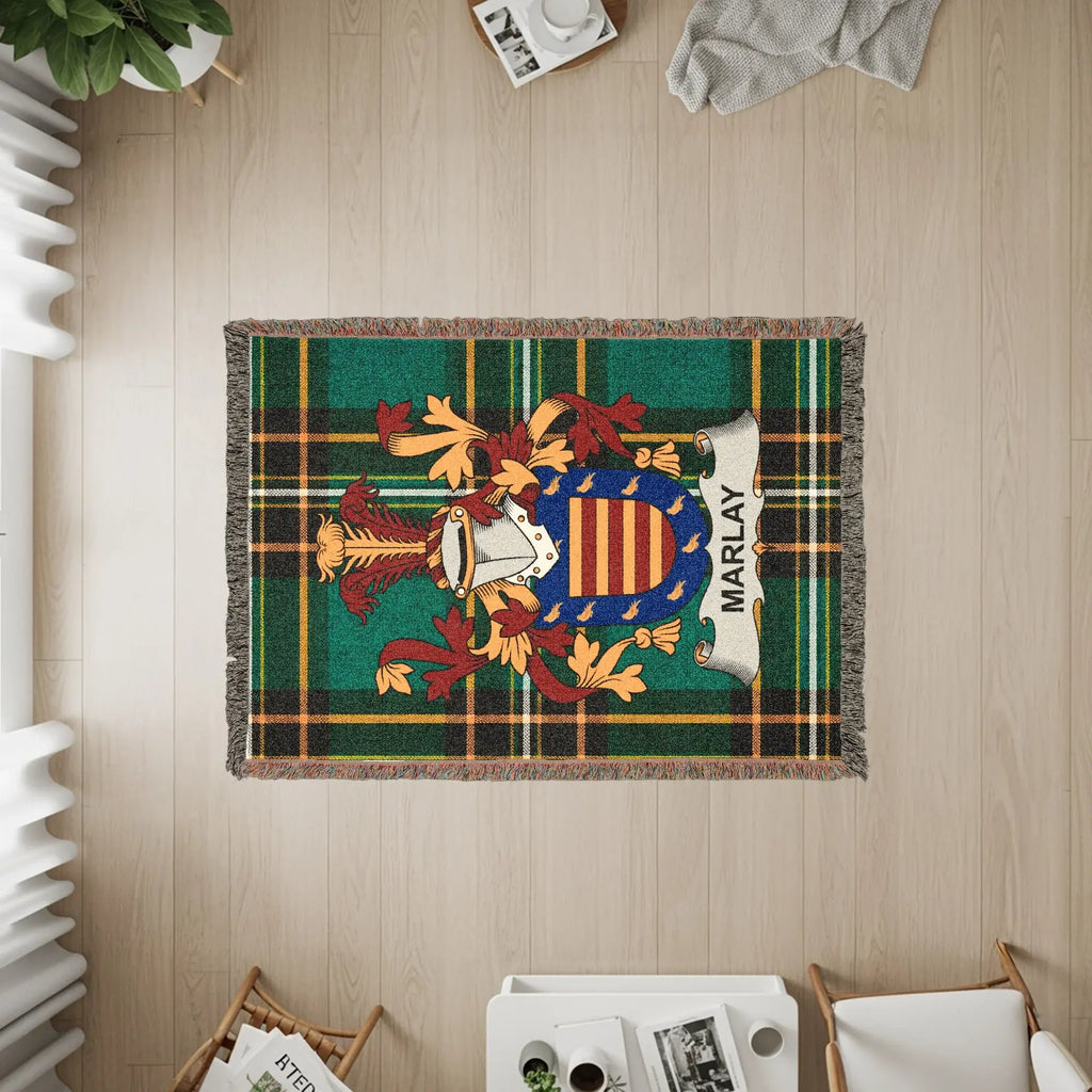 Marley tartan blanket with a family crest in the center.