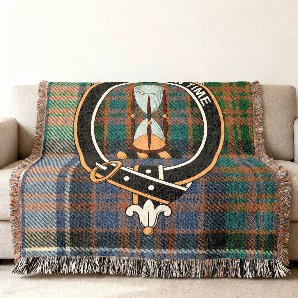 Clan Houston woven blanket — 80x60 inch full size, Houston crest and tartan on sofa display