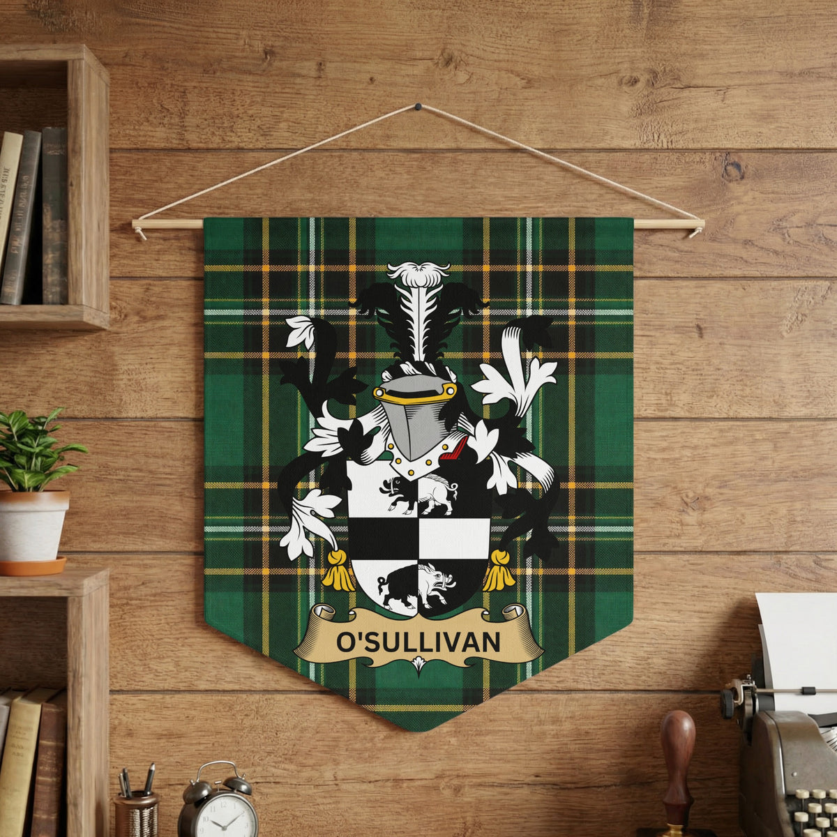 O'Sullivan family crest banner on green tartan fabric.