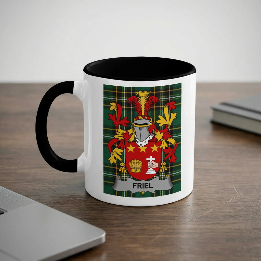 White mug with black rim featuring the Friel family crest on a plaid background.