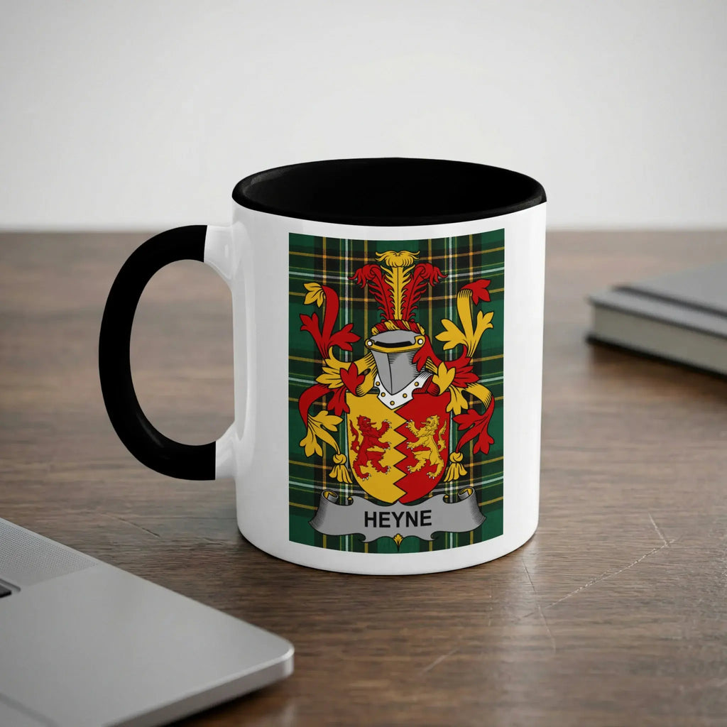 White mug with black handle displaying a family crest with the name "HEYNE" below.