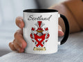 Annand Scottish family crest accent mug with Scotland above the coat of arms design