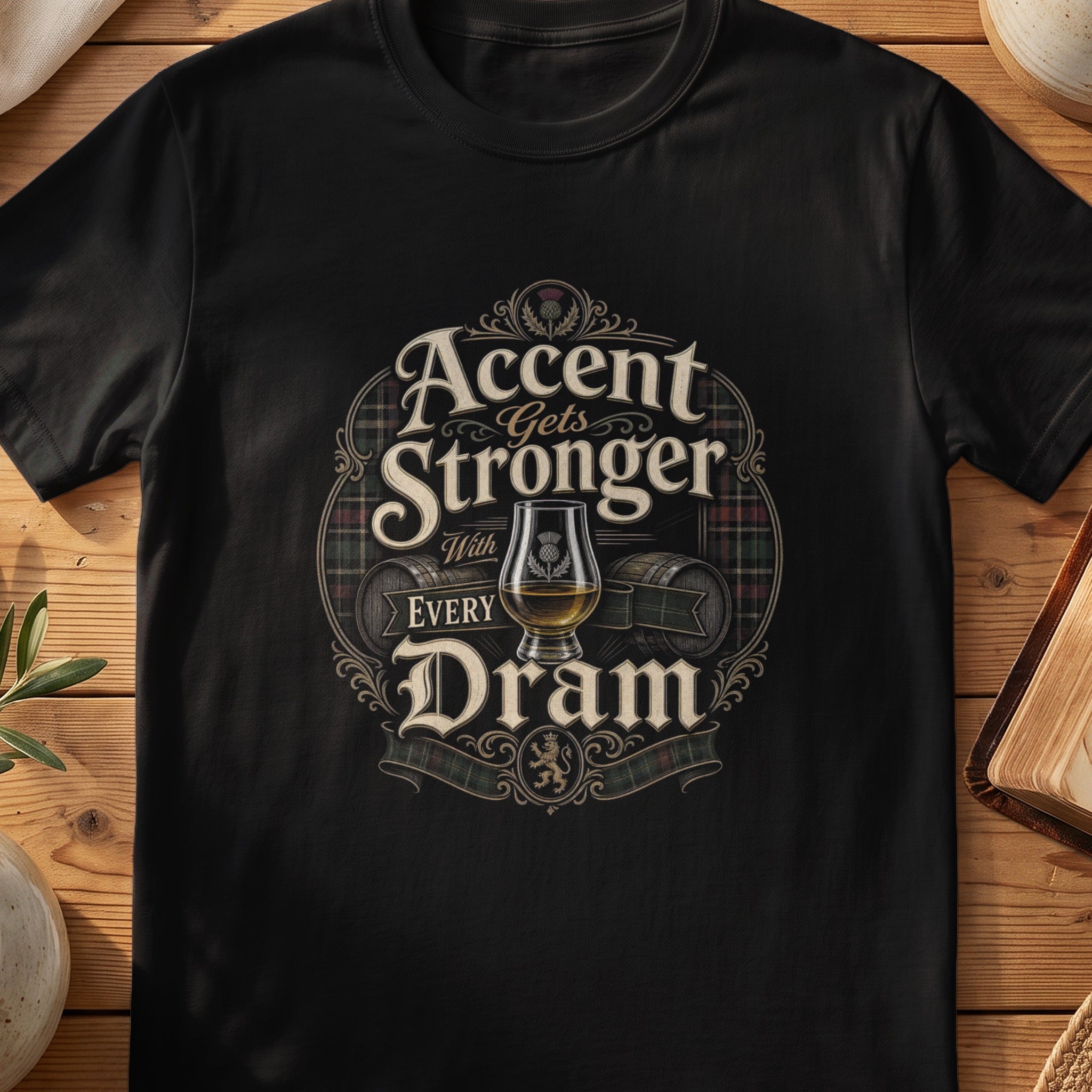 Black Gildan 64000 unisex T-shirt flatlay with Accent Gets Stronger With Every Dram Scottish graphic design