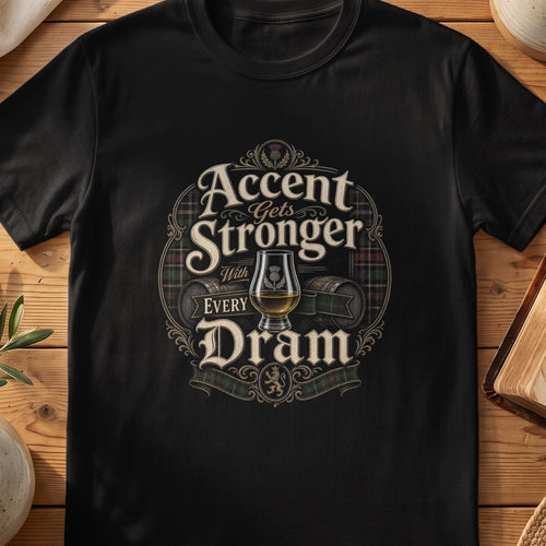 Black Gildan 64000 unisex T-shirt flatlay with Accent Gets Stronger With Every Dram Scottish graphic design