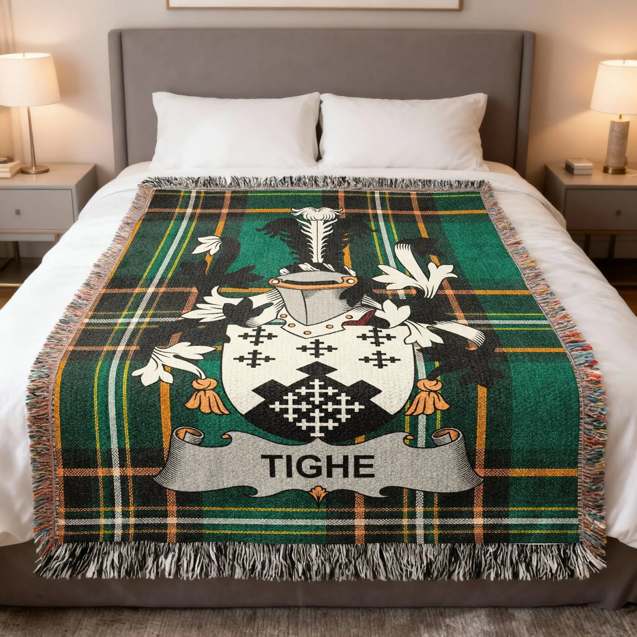 Tighe coat of arms on a plaid blanket draped across a bed.