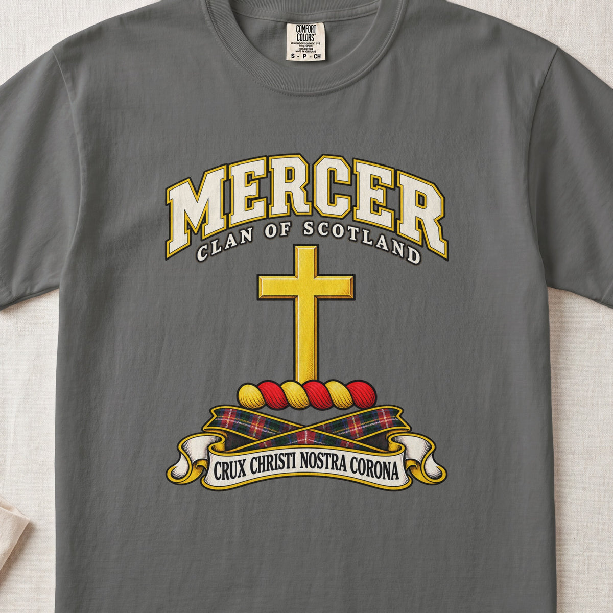 Mercer Scottish clan T-shirt in Pepper, front view with a golden cross and motto design.