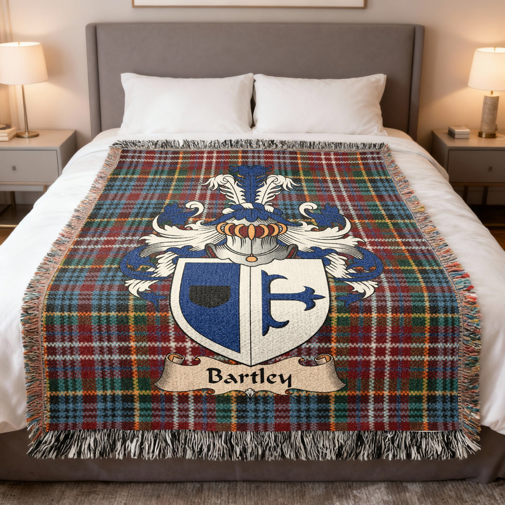 Bartley family crest emblem on a Caledonia tartan woven blanket