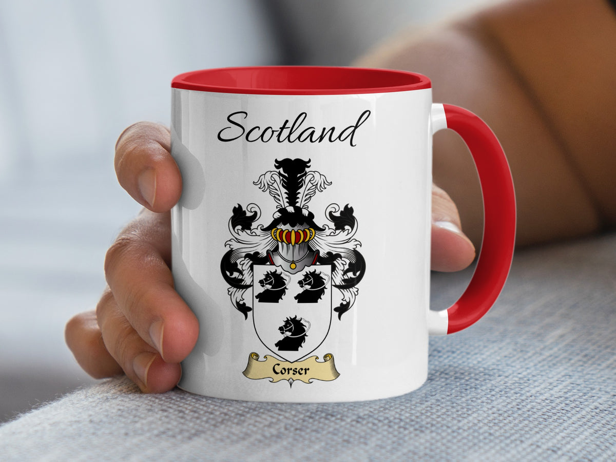 Red-accent Corser Scottish surname mug with matching handle and interior and coat of arms artwork beneath “Scotland”.